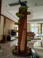 Rear view of the Green cat tower showing the trunk and rear surface