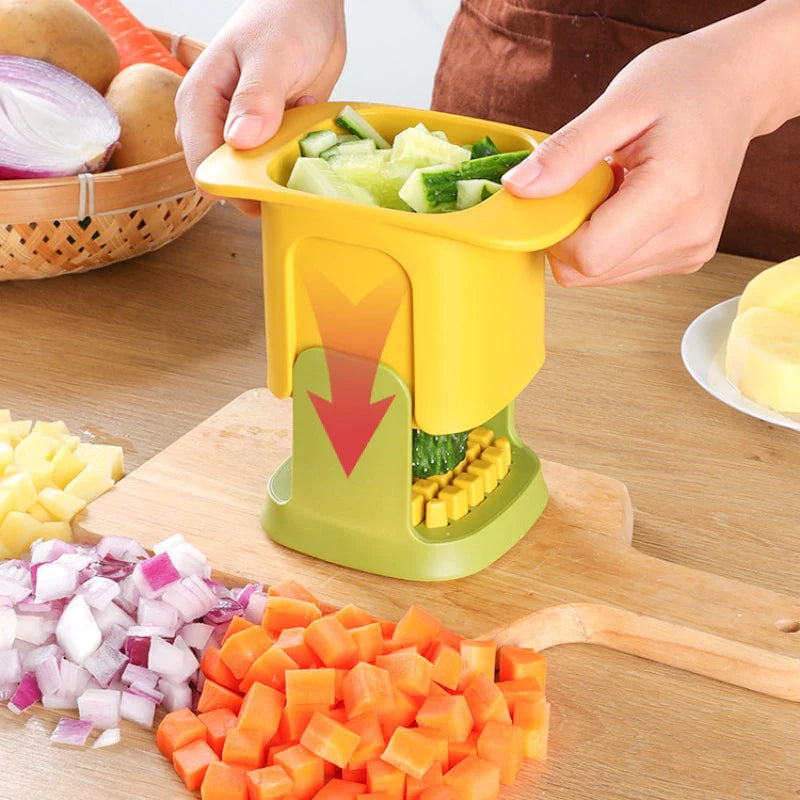 Hand-operated yellow and green chopper shown with chopped vegetables